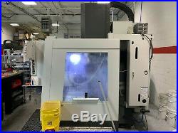 2015 Haas VF2 CNC with HRT210 Rotary Probe 20 ATC 4th Axis Auger P-Cool 300PSI TSC