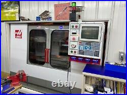 Haas VF-2 Rigid tapping, Chip conveyor, Programmable coolant