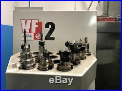Haas VF-2 VMC, 2015 WIPS, Under Power, Tooling Included, Video