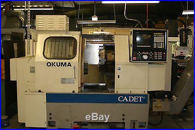 Okuma Cadet CNC Lathe With Hennig Chip Conveyor