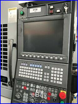 Okuma M460-VE VMC 2016, OPS-P300M Control, 32-ATC, Chip Conveyor, Coolant Tank