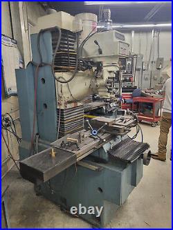 Southwestern Industries TRAK DPM CNC Vertical Bed Mill, Under Power, Tooling