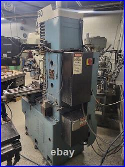 Southwestern Industries TRAK DPM CNC Vertical Bed Mill, Under Power, Tooling