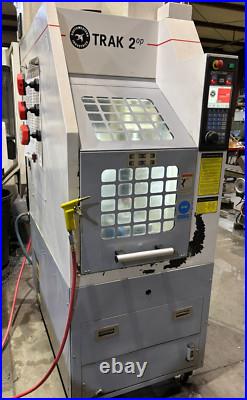 Southwestern Industries Trak 2OP-M11 Mini CNC VMC Mill ATC, with59 tool holders Southwestern Industries Trak 2OP-M11 Mini CNC VMC Mill ATC, with59 tool holders