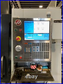 Used 2014 Haas VF-4 CNC Vertical Machining Center Mill 4th Axis Ready Chip Auger
