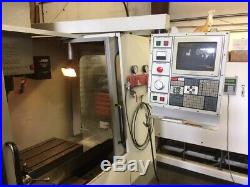 Used Haas VF-2 CNC Vertical Machining Center 30x16 Mill CT40 4th Axis Ready 1994
